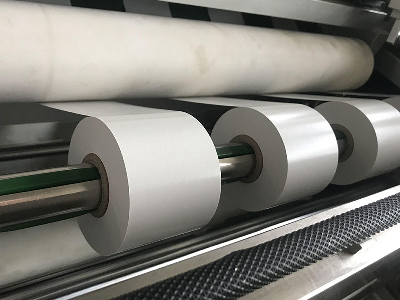Tape slitting machine: sticky problems, neatly solved
